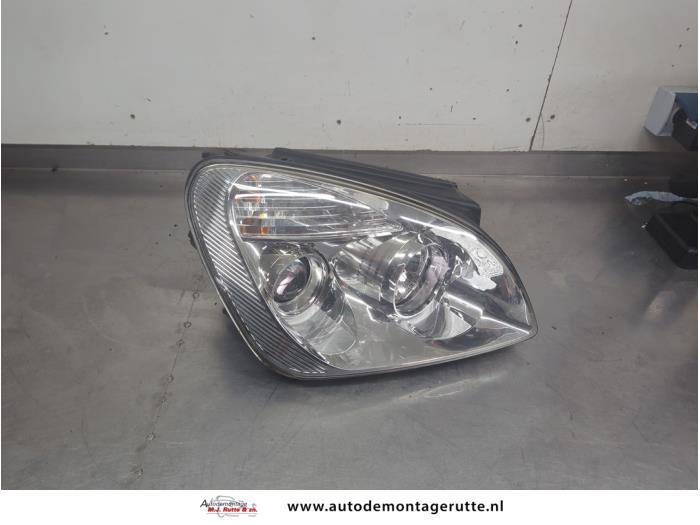 Gebruikte Koplamp rechts Kia Carens O199871