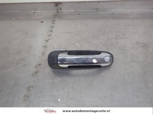 O199957 Gebruikte portiergreep 4deurs rechts-achter Jeep Cherokee