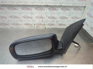 O200003 Gebruikte spiegel buiten links Daihatsu Sirion