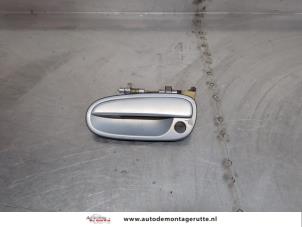 O200028 Gebruikte deurgreep 4deurs links-voor Hyundai Matrix