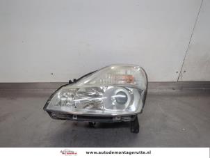 O200042 Gebruikte koplamp links Renault Modus