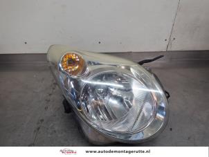 O200129 Gebruikte koplamp rechts Suzuki Alto