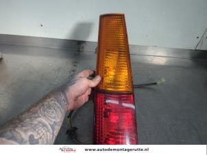 O200163 Gebruikte achterlicht links Suzuki Ignis