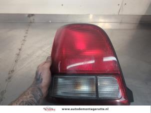 O200213 Gebruikte achterlicht links Honda Logo