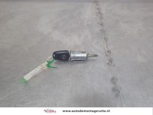 O200265 Gebruikte sleutel+contactslot Opel Combo
