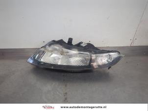 O200272 Gebruikte koplamp links Honda Civic