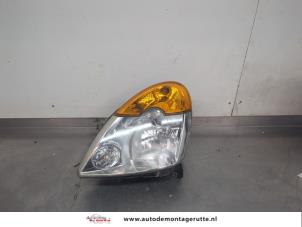 O200275 Gebruikte koplamp links Renault Modus