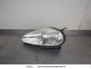 O200277 Gebruikte linker koplamp Fiat Punto Grande