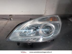 O200527 Gebruikte linker koplamp Renault Megane Scenic