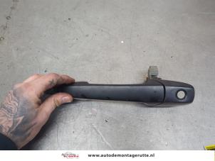 O200559 Gebruikte deurgreep 4deurs links-voor Mazda 2