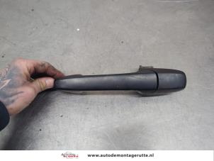 O200560 Gebruikte deurgreep 4deurs links-achter Mazda 2