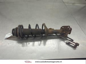 O200588 Gebruikte schokdemperpoot links-voor Nissan Pixo