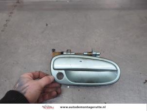 O200624 Gebruikte portiergreep 4deurs rechts-voor Hyundai Matrix