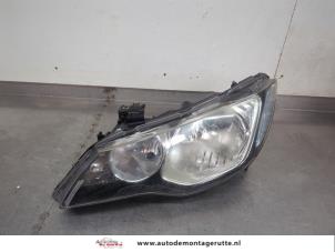O200652 Gebruikte koplamp links Honda Civic