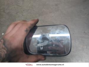 O200666 Gebruikte spiegelglas links Ford Fiesta