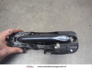 O200851 Gebruikte portiergreep 4deurs links-voor Renault Megane