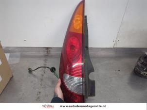 O200958 Gebruikte achterlicht links Nissan Almera Tino