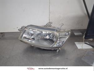 O200962 Gebruikte linker koplamp Daihatsu Materia
