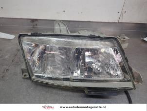 O200989 Gebruikte rechter koplamp Saab 9-5