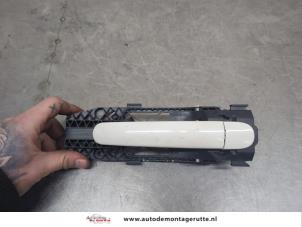 O201068 Gebruikte portiergreep 4deurs rechts-achter Volkswagen UP