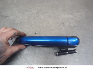 O201121 Gebruikte portiergreep 4deurs rechts-achter Opel Agila