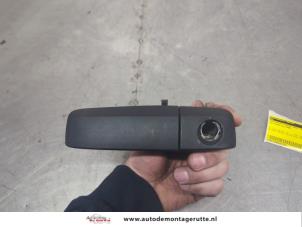 O201225 Gebruikte portiergreep 4deurs links-voor Fiat Panda