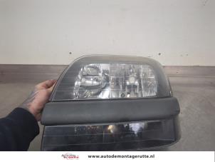 O201230 Gebruikte koplamp links Fiat Doblo