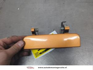 O201343 Gebruikte achterklep handgreep Nissan Micra