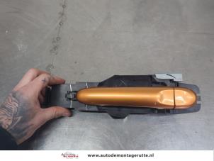 O201359 Gebruikte portiergreep 4deurs links-achter Nissan Micra