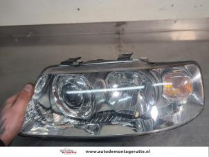 O201423 Gebruikte koplamp links Audi A3