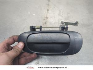 O201558 Gebruikte portiergreep 4deurs links-achter Mitsubishi Space Star