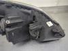 Gebruikte Koplamp links Opel Zafira O201571