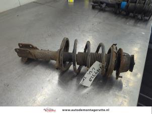 O201616 Gebruikte schokdemperpoot links-voor Suzuki Swift