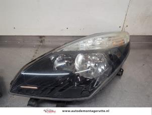 O201633 Gebruikte koplamp links Renault Grand Scenic
