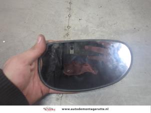 O201699 Gebruikte spiegelglas links Kia Rio