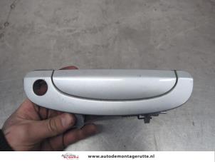 O201778 Gebruikte portiergreep 4deurs links-voor Hyundai Getz