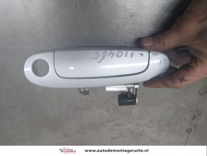 O201788 Gebruikte portiergreep 2deurs links Toyota Yaris