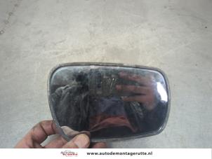 O201813 Gebruikte spiegelglas links Toyota Starlet