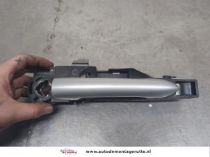 O201867 Gebruikte portiergreep 4deurs links-voor Renault Clio