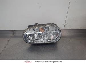 O202001 Gebruikte koplamp links Volkswagen Golf