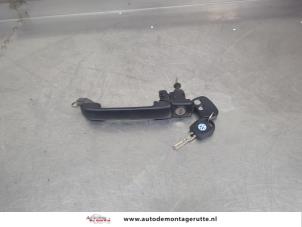 O202014 Gebruikte portiergreep 2deurs links Volkswagen Golf