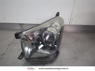 O202115 Gebruikte koplamp links Toyota IQ