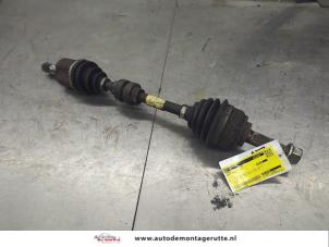 O202269 Gebruikte cardanas links-voor (vwa) Nissan Micra