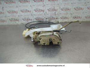 O202316 Gebruikte slotmechaniek portier 2deurs links Toyota Celica