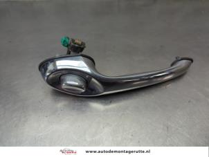 O202343 Gebruikte portiergreep 4deurs links-achter Chrysler PT Cruiser