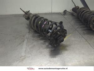 O202379 Gebruikte schokdemperpoot links-voor Opel Antara