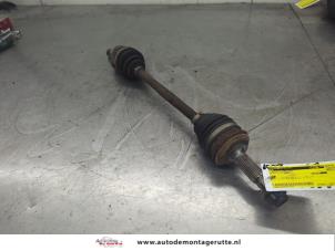 O202410 Gebruikte aandrijfas links-voor Toyota IQ