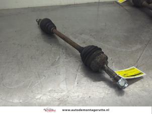 O202412 Gebruikte aandrijfas links-voor Citroen C3