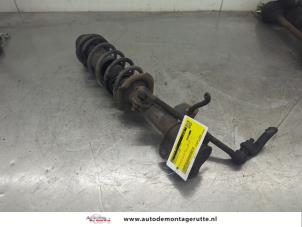 O202422 Gebruikte veerpoot links-voor Nissan Micra