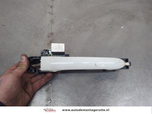 O202482 Gebruikte portiergreep 2deurs links Ford KA
